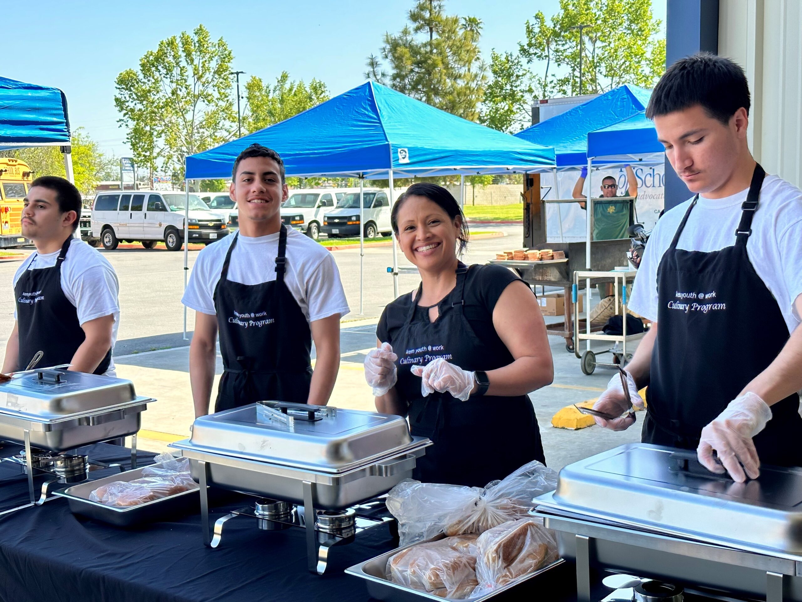 Culinary students serving food