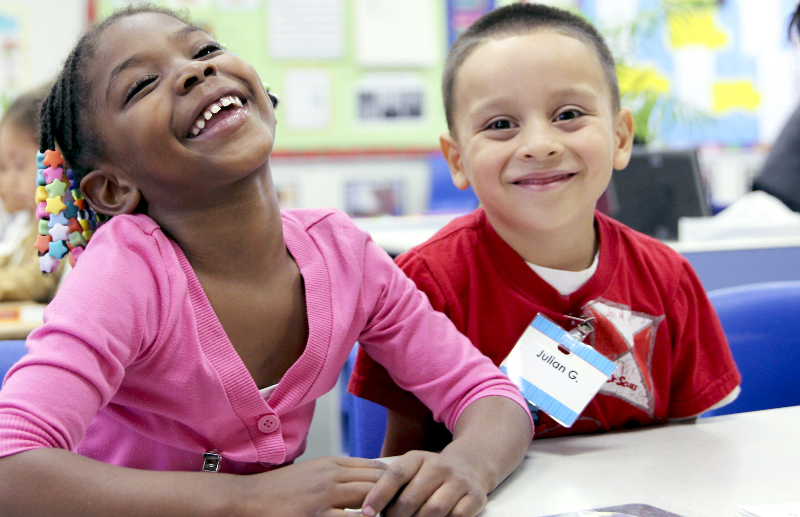 Two kids laughing