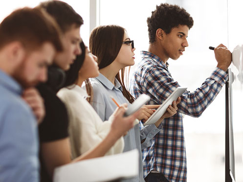 Students taking notes